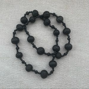 Oaxaca black clay carved bead necklace. 38 in long.